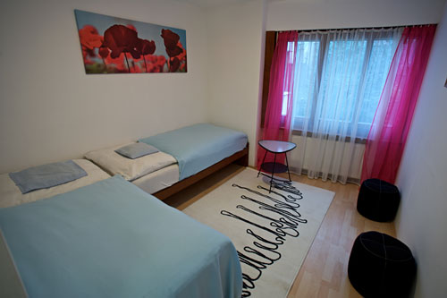 The second bedroom has 2 single beds which can be easily moved and put together as a double bed.