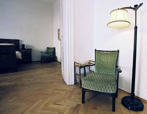 
A comfy chair, living room detail in Spanelska apartment. Spanelska, an apartment offered by Prague Accommodations, is near to Prague’s Wenceslas Square and the main train station.