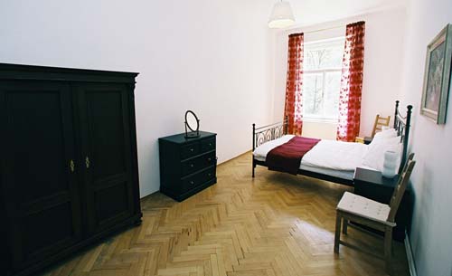 
The master bedroom in Spanelska apartment. Spanelska, an apartment offered by Prague Accommodations, is near to Prague’s Wenceslas Square and the main train station.