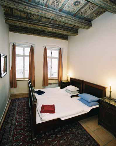 Bedroom  of Vlasska 1. Vlasska 1, an apartment offered by Prague Accommodations, is close to Prague Castle and the Lesser Town Square.