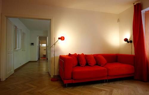 
The orange living room in Janska 7, appartament 5.  Prague Hotel apartment accommodation is offered  by accommodation in Prague. This short-term apartment rental Accomodation is close to Prague’s Charles Bridge and Malostranske Namesti is in Mala Strana and is offered by apartments in Prague