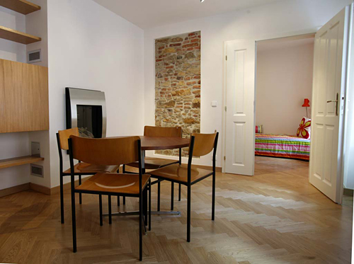 
Dining room in appartament 6 in Janska 7. Prague Hotel apartment accommodation offered  by accommodations in Prague. This short-term apartment rental Accomodation is close to Prague’s Charles Bridge and Malostranske Namesti is in Mala Strana near Nerudova Street and the US Embassy