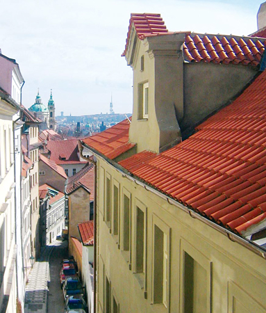 Janska Street and St. Nicholas Cathedral from the window of Apt. 4 in Residence Janska, an appartament offered by Apartments in Prague, a Prague Hotel apartment accommodation company which lets accommodations in Prague. This short-term apartment rental Accomodation is close to Prague’s Charles Bridge and Malostranske Namesti is in Mala Strana.