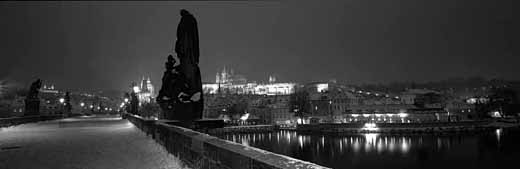 Winter Blankets the Charles Bridge. Accommodation in Prague offered by Prague Accommodations, apartments in Prague.