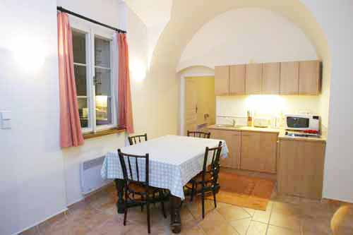 Kitchen of Vlasska 2. . Vlasska 2, an apartment offered by Prague Accommodations, is close to Prague Castle and the Lesser Town Square.