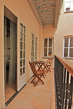 Balcony with table<br />and chairs